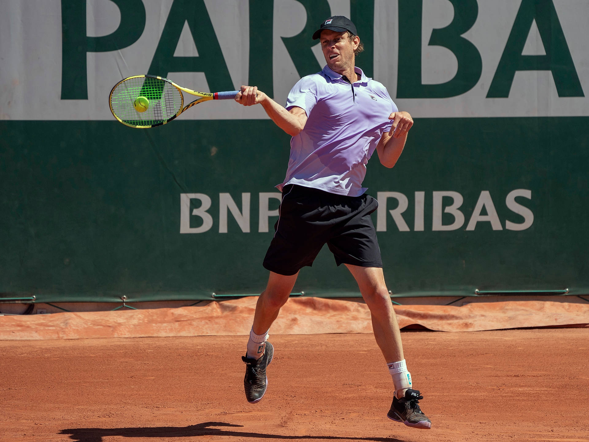 Sam Querrey Returning Shot Background