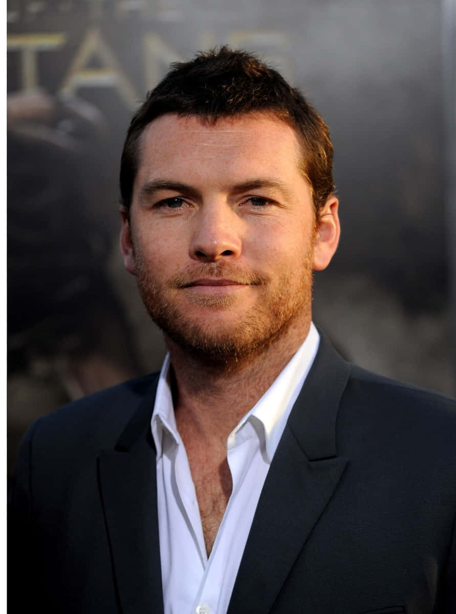 Sam Worthington Formal Black Suit Photography Background