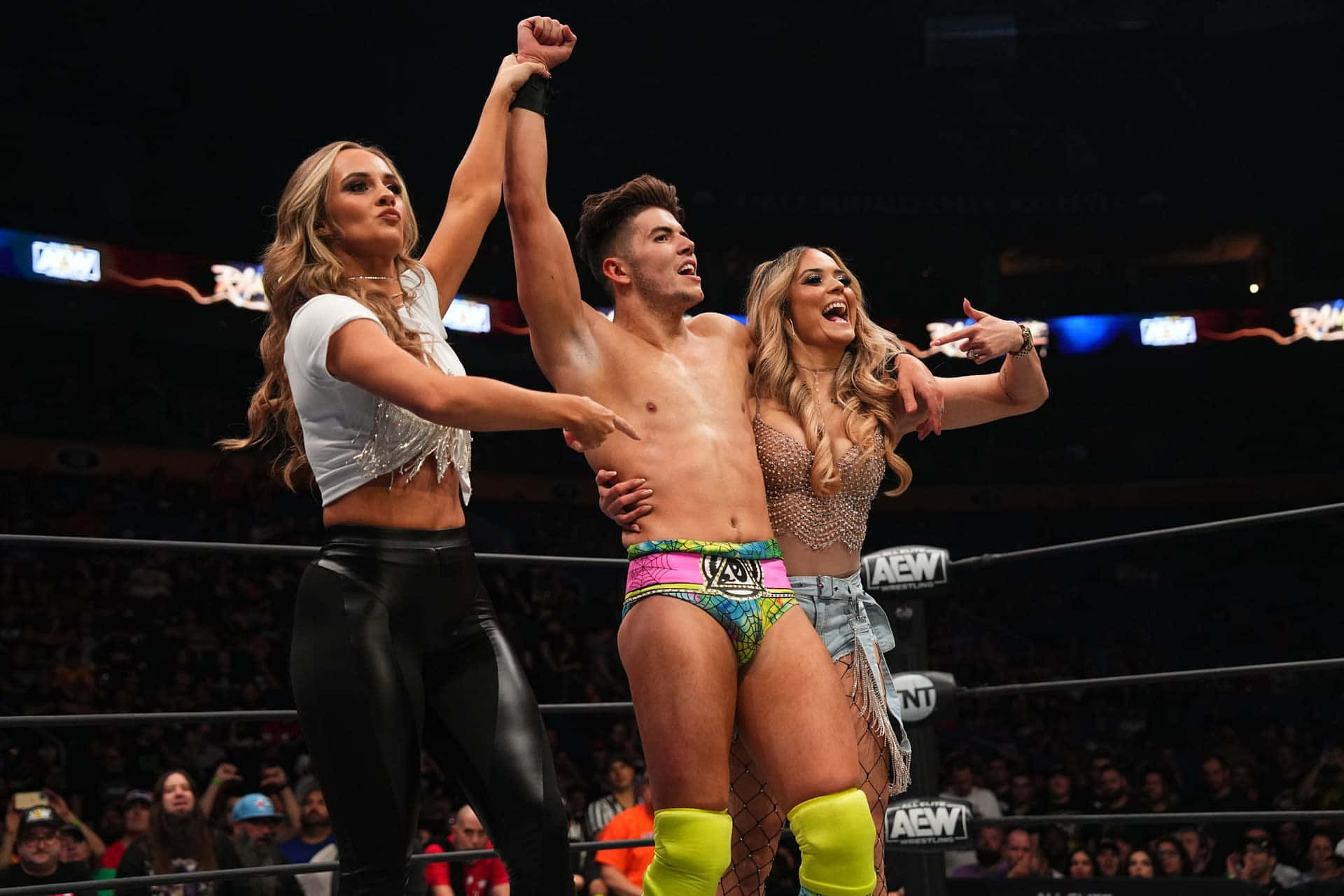 Sammy Guevara With Brazilian Wrestler Wife Tay Melo Background