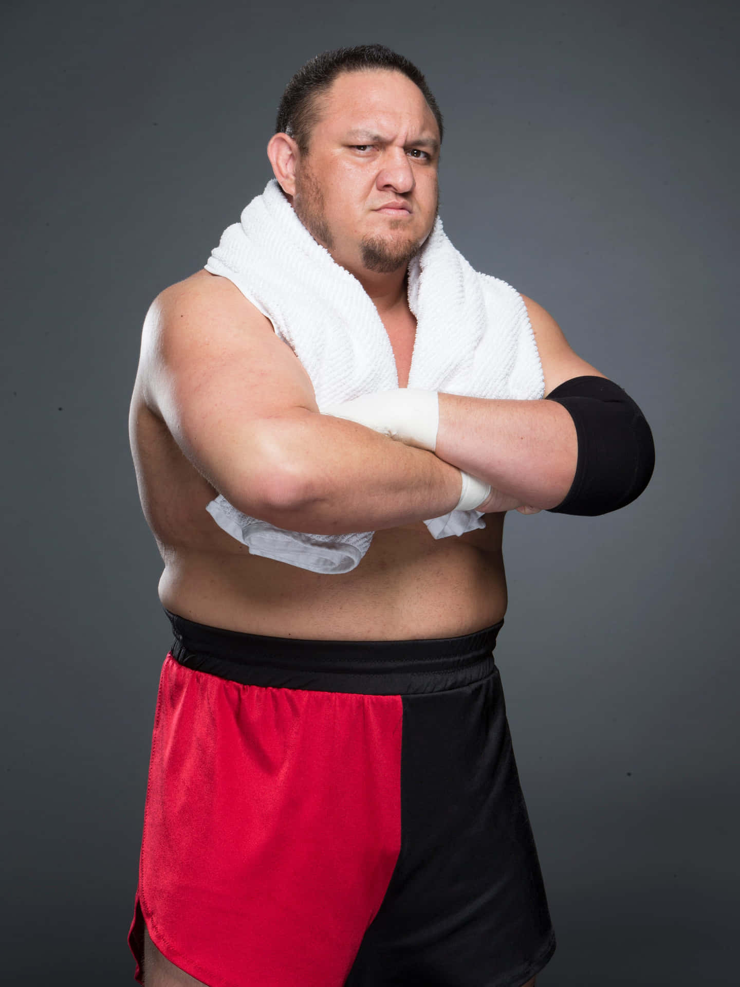 Samoa Joe Crossed Arms Tough Look Background