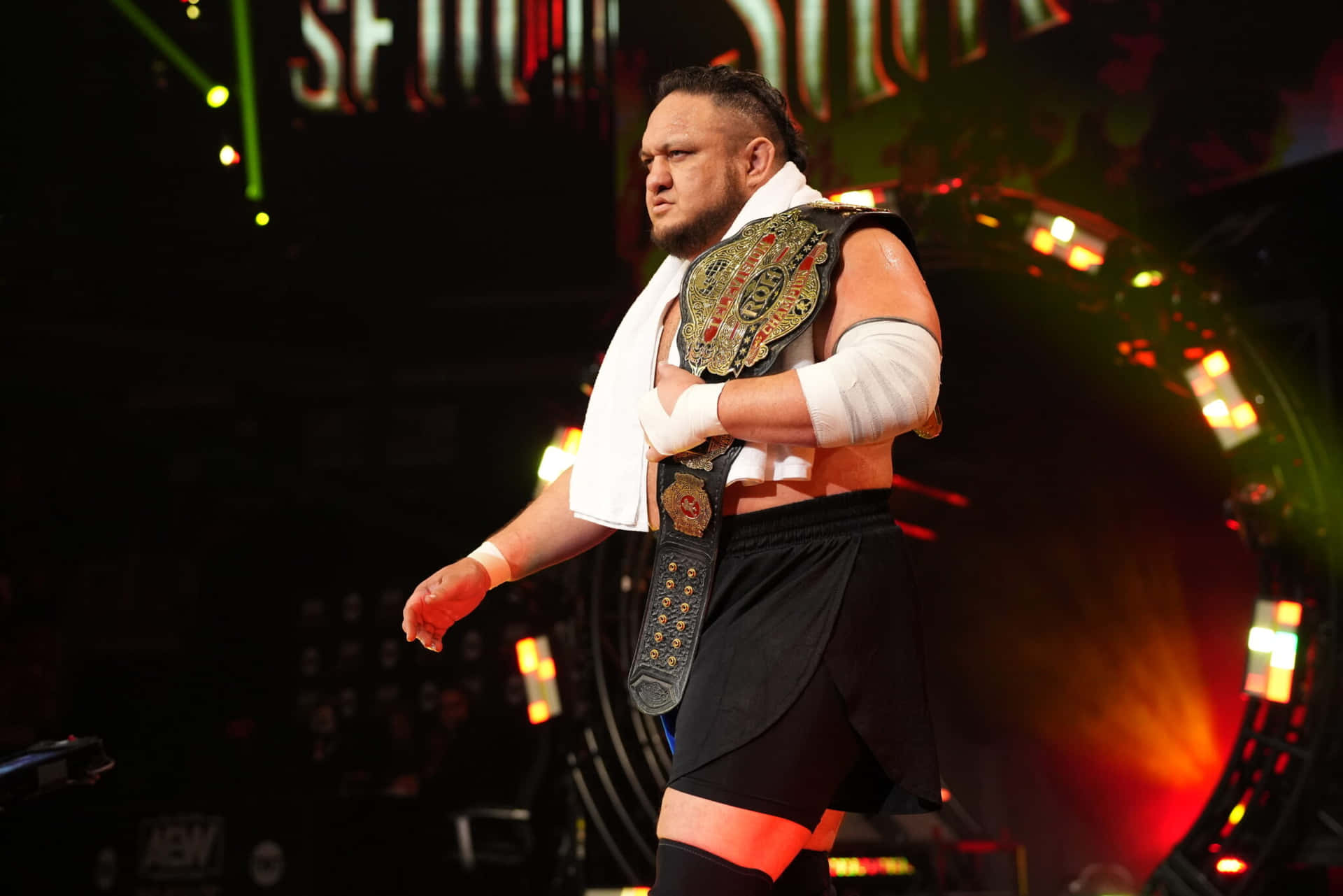 Samoa Joe In Action During The United States Championship Match Background