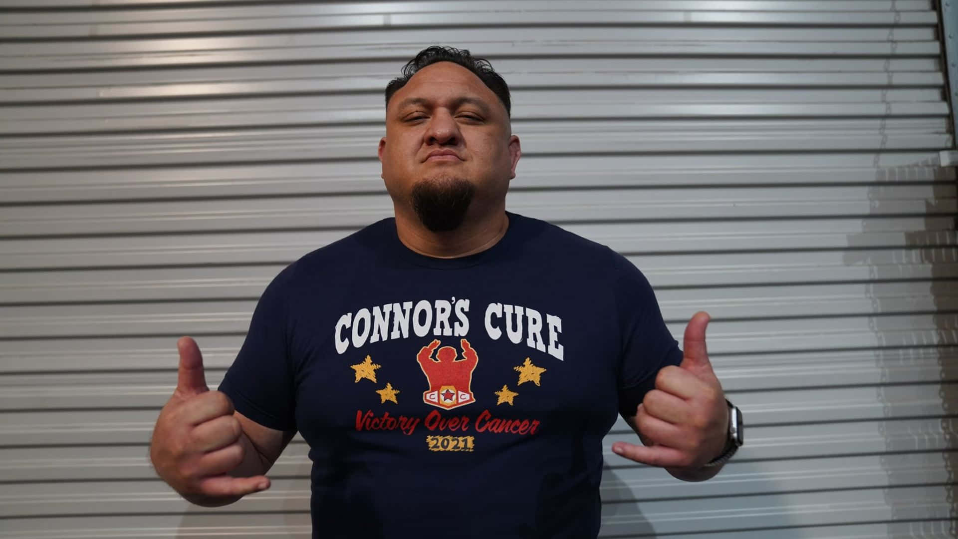 Samoa Joe Posing Merch Shirt Background