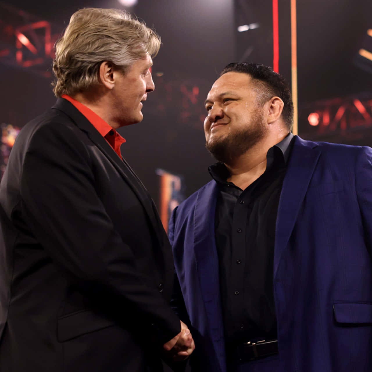 Samoa Joe Smiling To William Regal Wwe Background