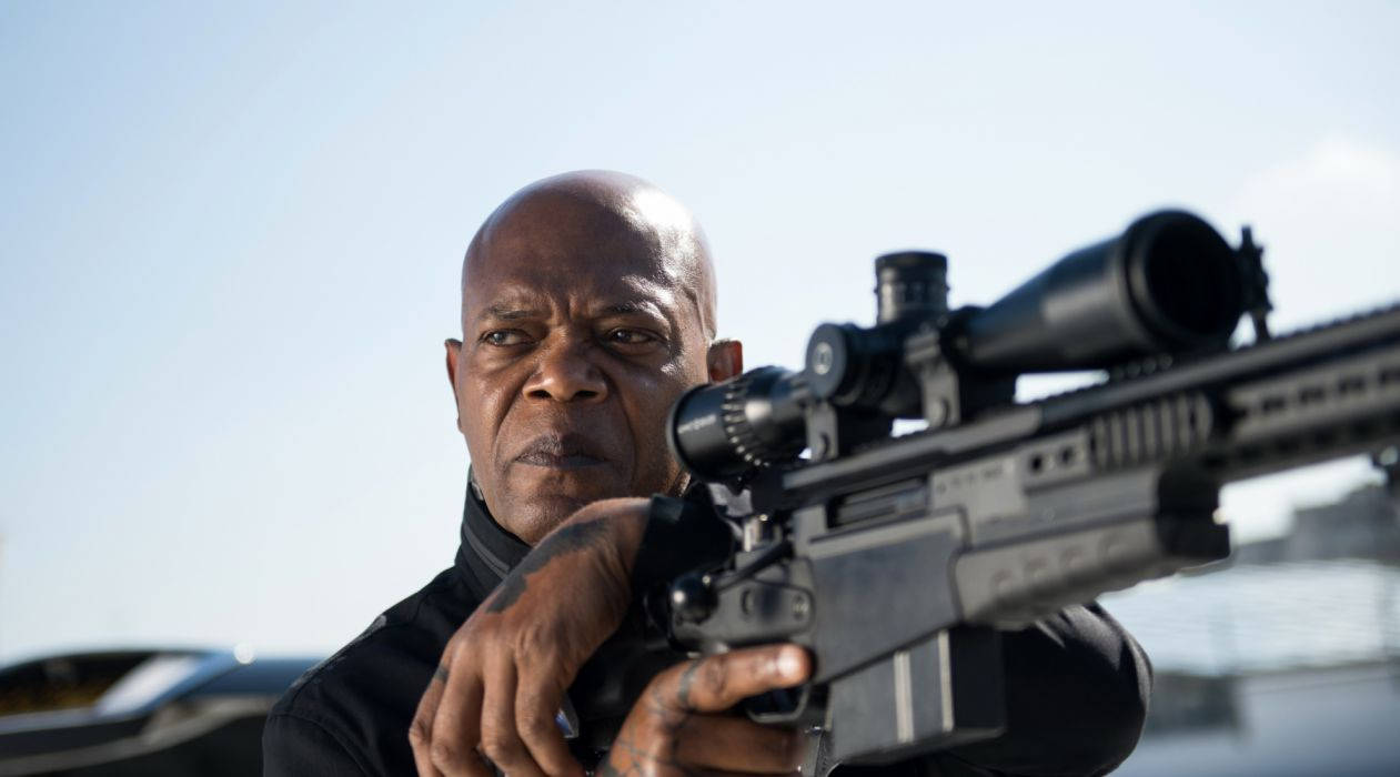 Samuel L Jackson Aiming A Sniper Rifle Background