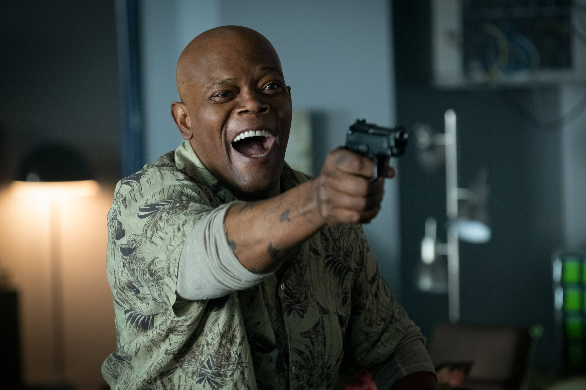 Samuel L Jackson Laughing With Gun Background