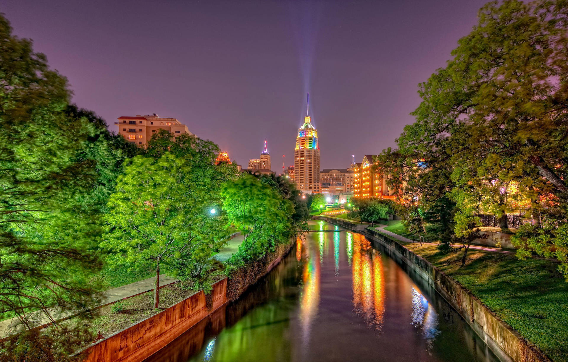 San Antonio River Walk Leading To City Background