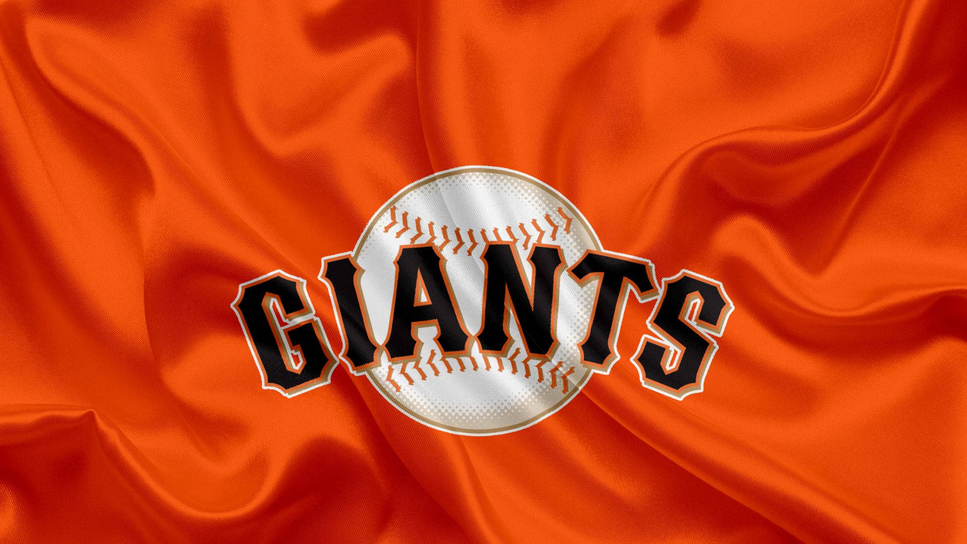 San Francisco Giants Logo On Cloth Background