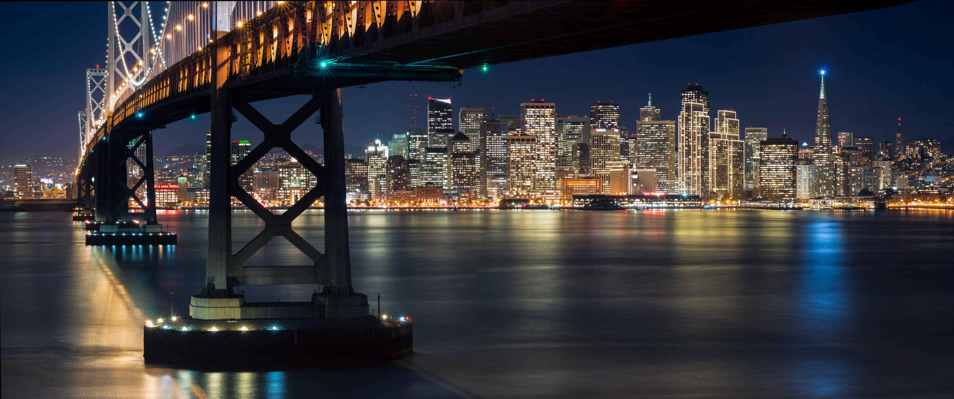 San Francisco Skyline Under Bridge Background