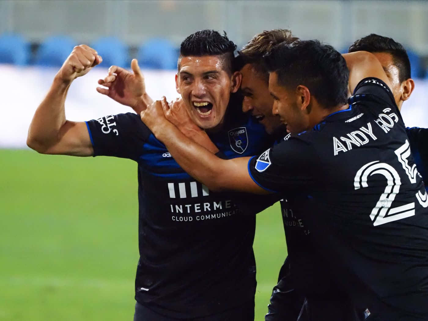 San Jose Earthquakes Midfielder Cristian Espinoza Celebrating With Teammates Background