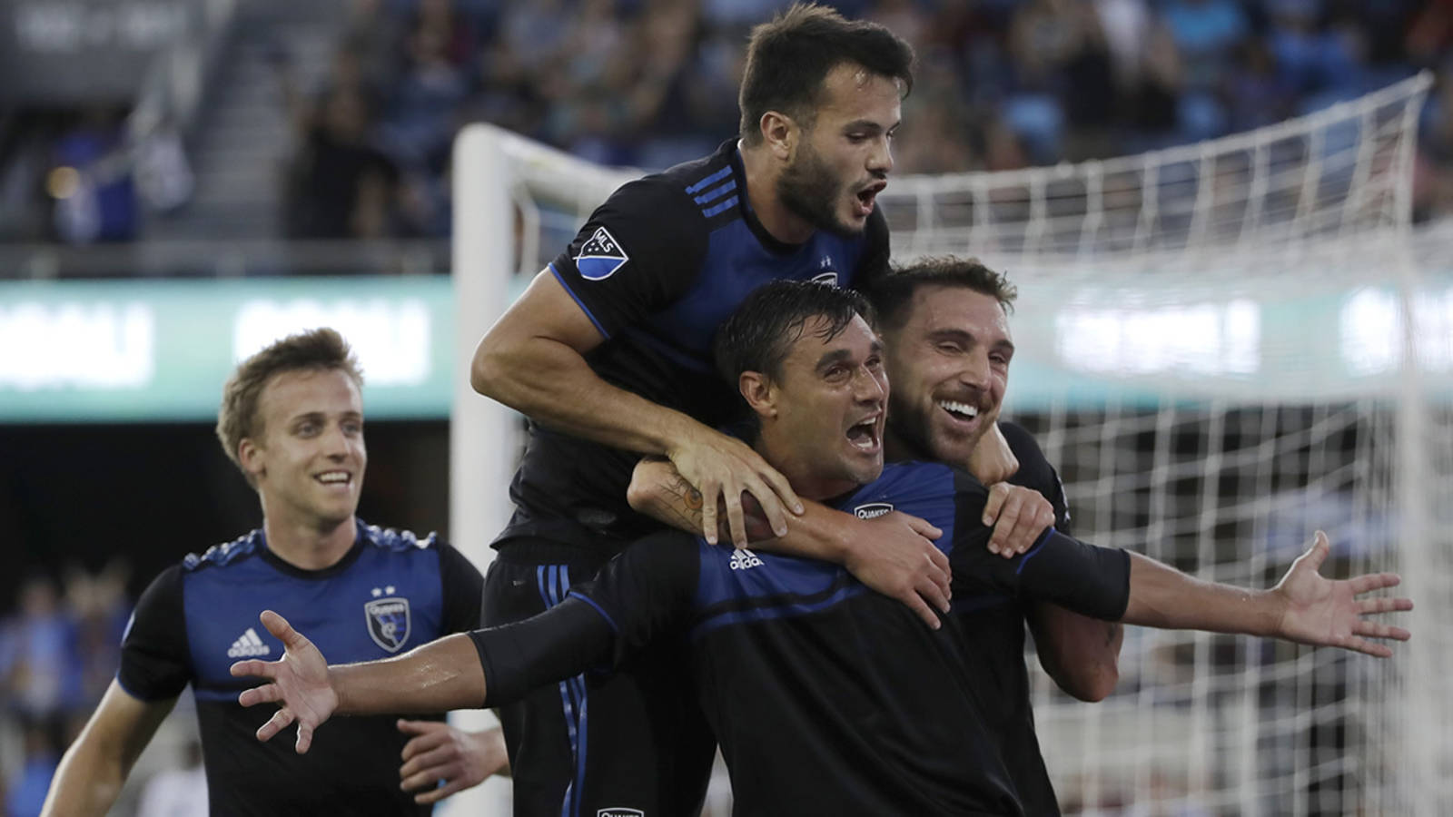 San Jose Earthquakes Soccer Players Celebrating Background