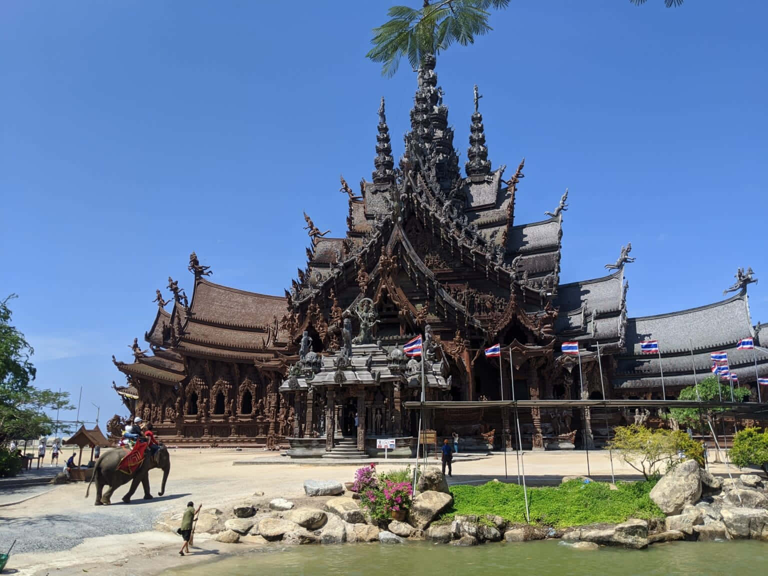 Sanctuary Of Truth Beneath Blue Sky In Thailand
