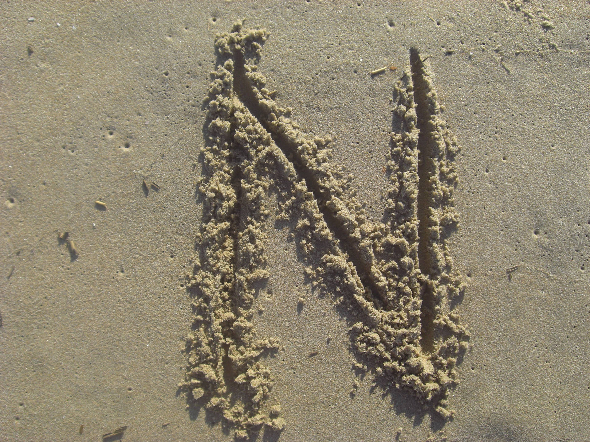 Sand Letter N Background