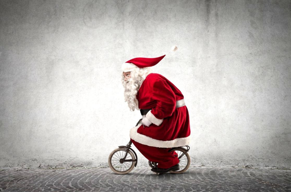 Santa Claus Riding Bicycle Funny Christmas Background