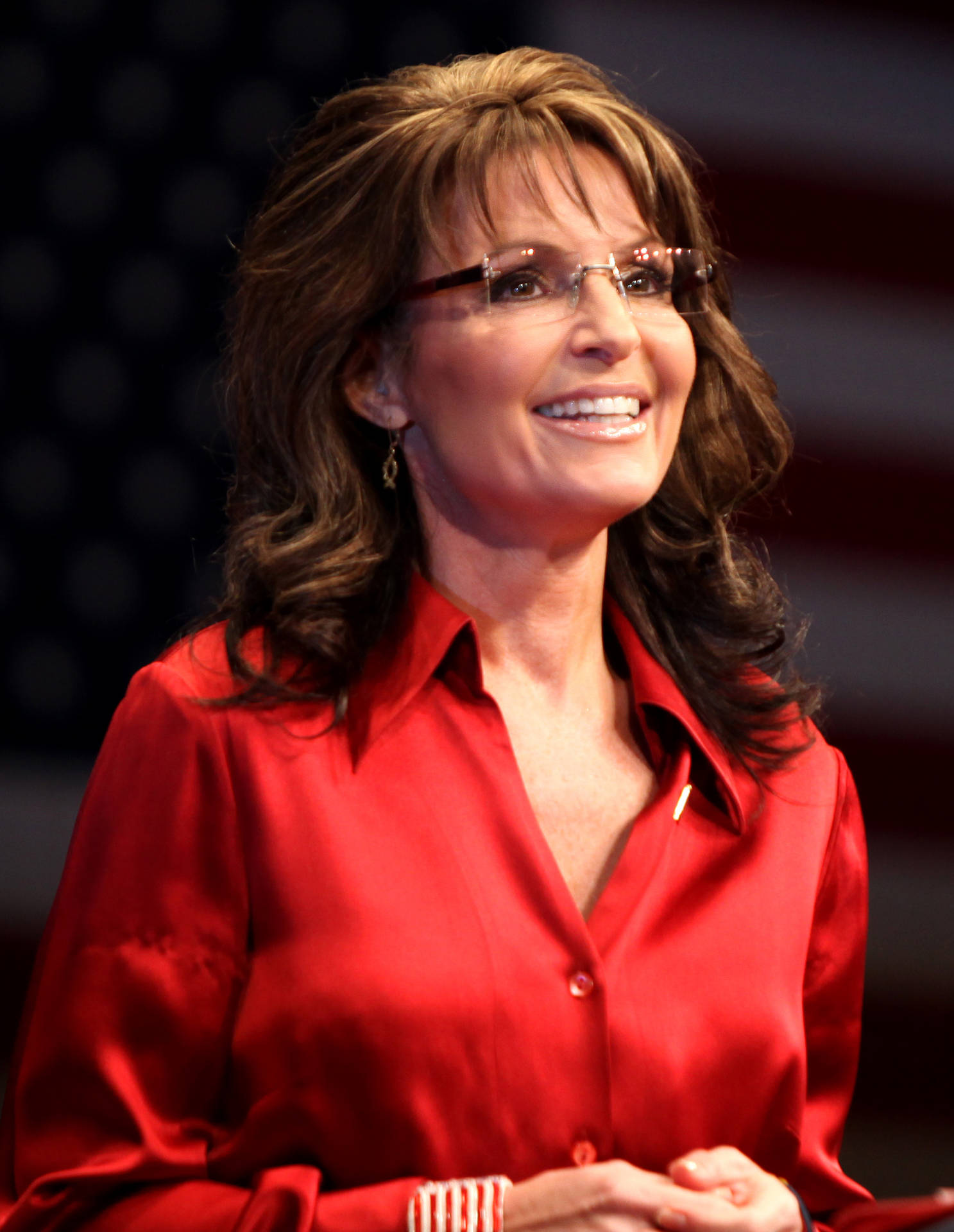 Sarah Palin With Blurry Flag Background