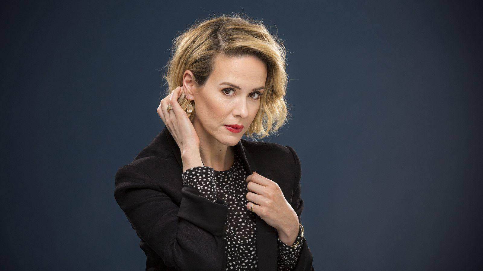 Sarah Paulson In Corporate Attire Background