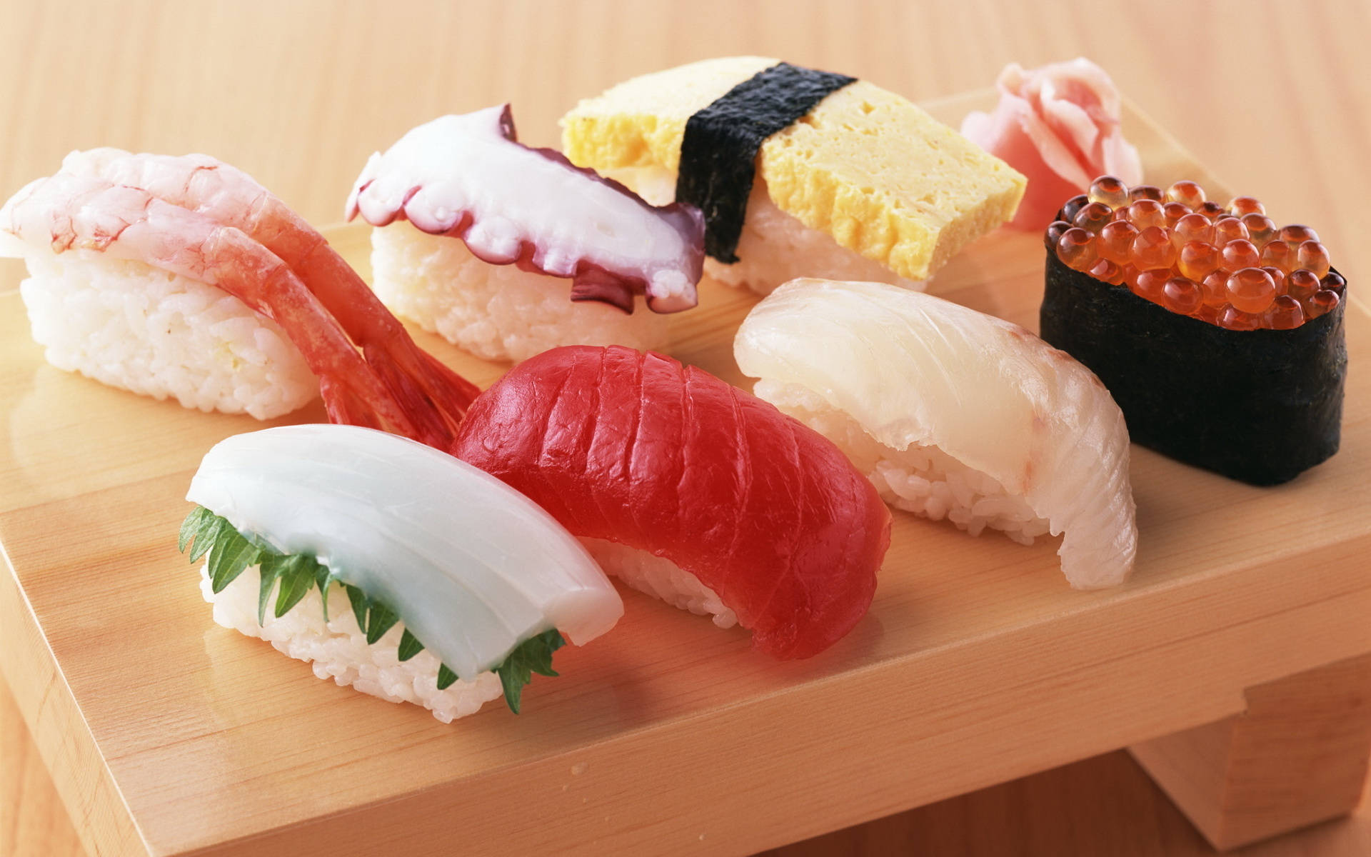 Sashimi And Sushi On Serving Board Background