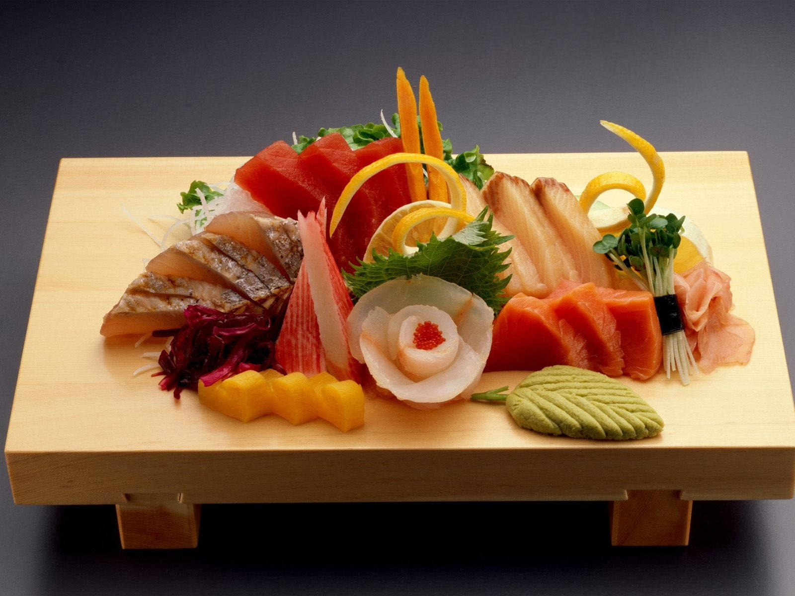 Sashimi On Wooden Serving Board Background