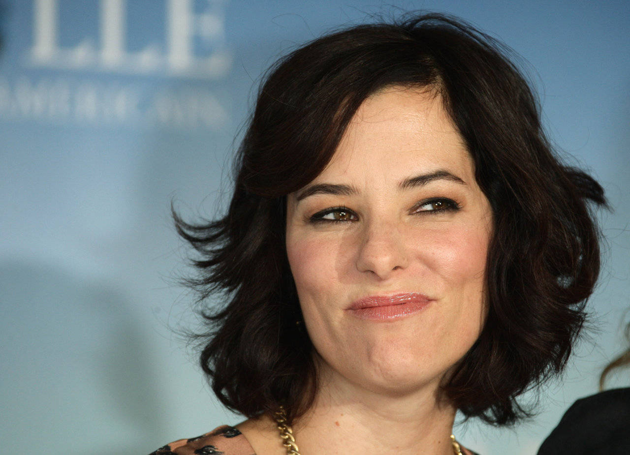 Satellite Award Nominee Parker Posey Background