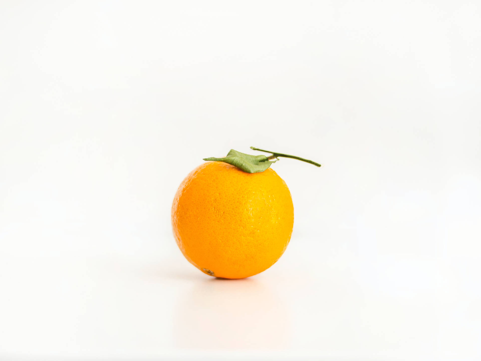 Satsuma Mandarin On White Background Background