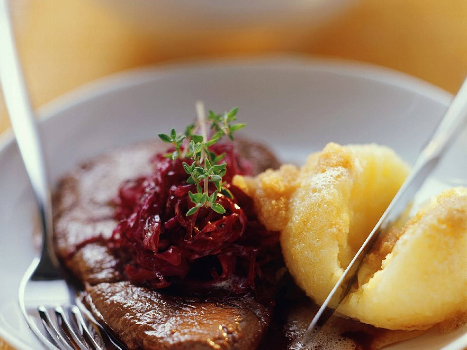 Sauerbraten Dish With Red Cabbage And Potato Dumplings Background