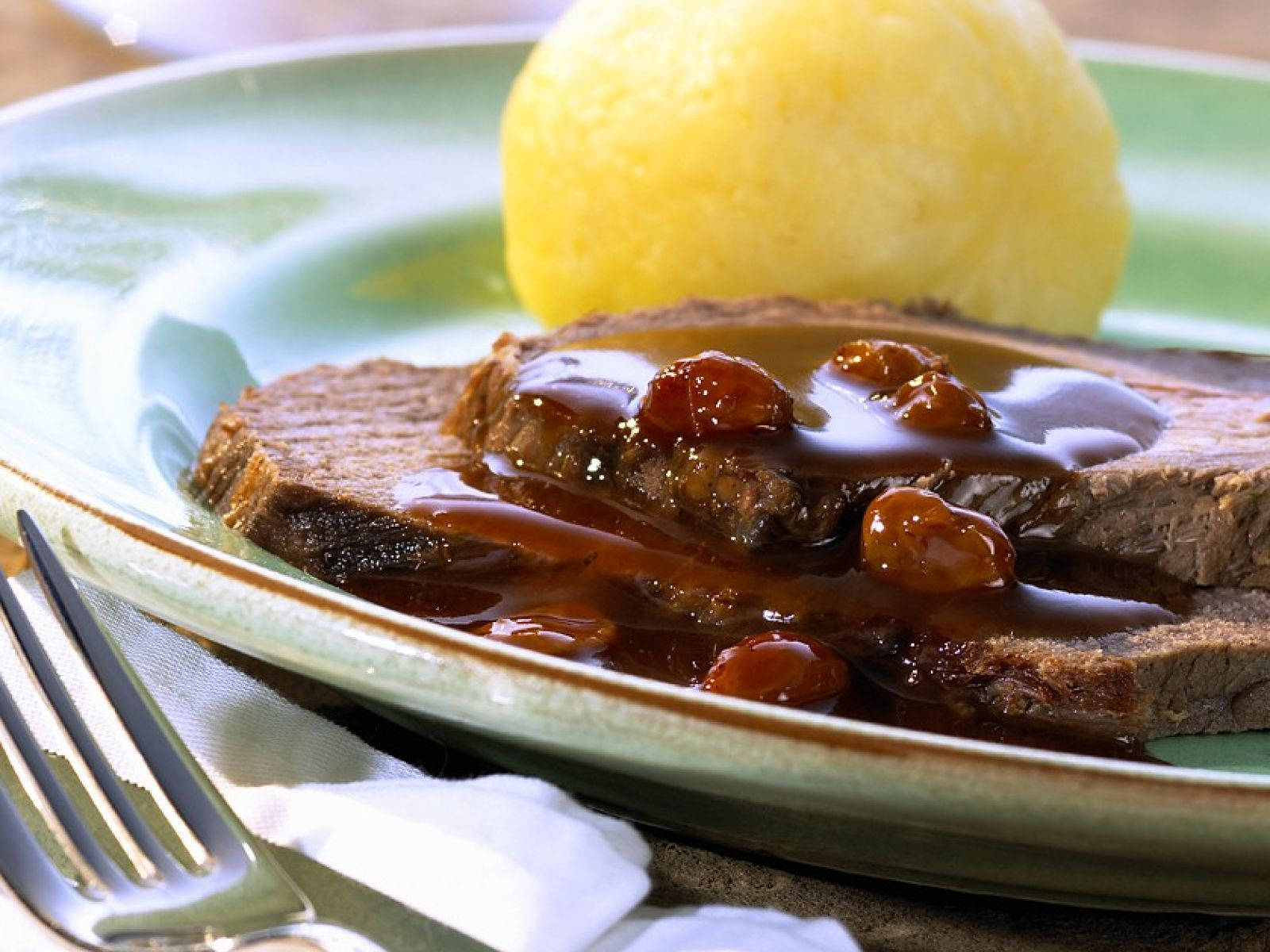 Sauerbraten German Meal With Potato Dumplings Background