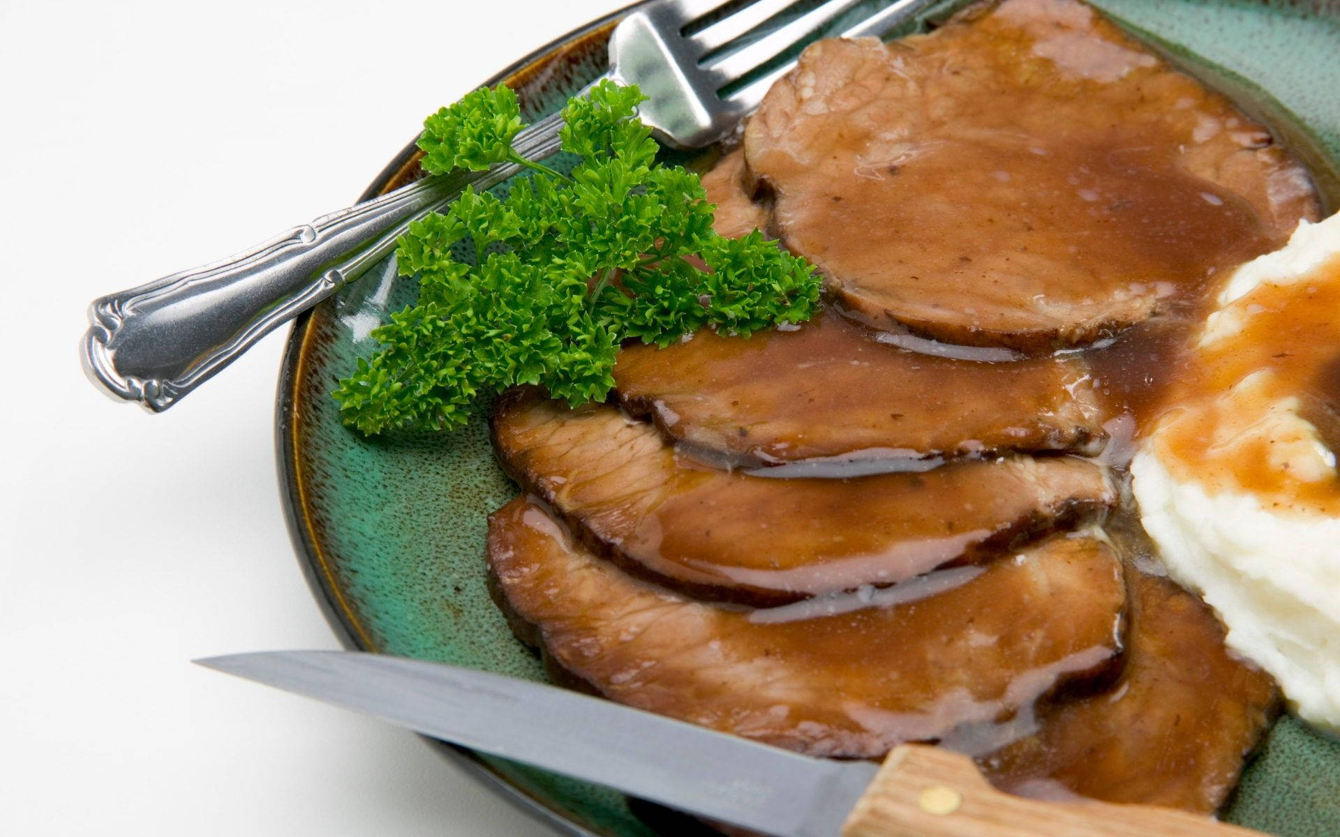 Sauerbraten Traditional German Dish Topped With Parsley Background