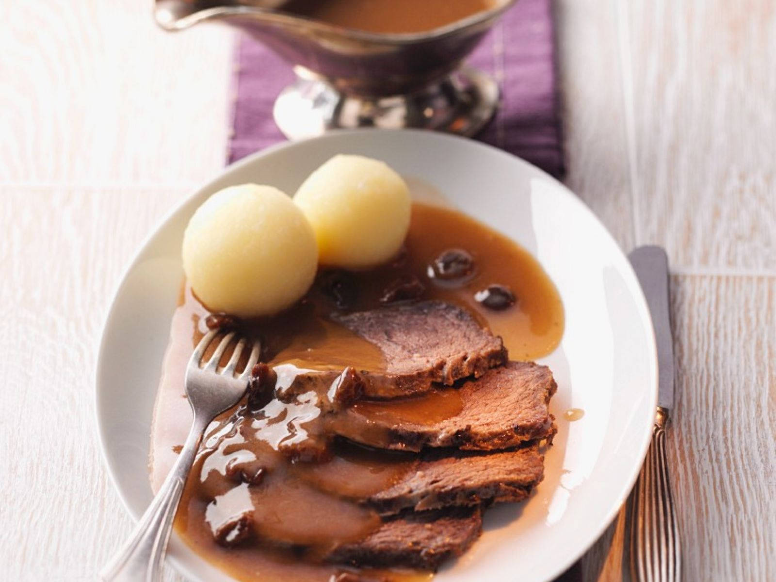 Sauerbraten Traditional German Meal With Round Potato Dumplings Background