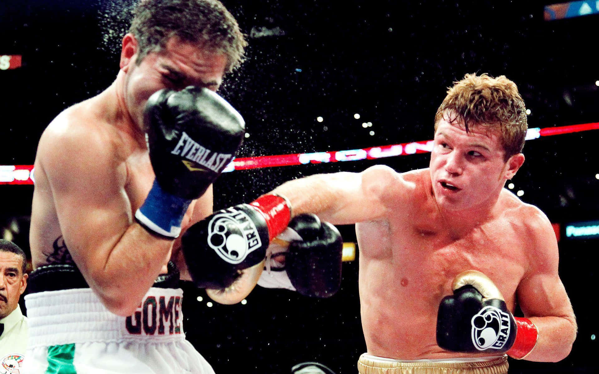 Saul 'canelo' Alvarez Delivering A Powerful Punch In The Boxing Ring Background