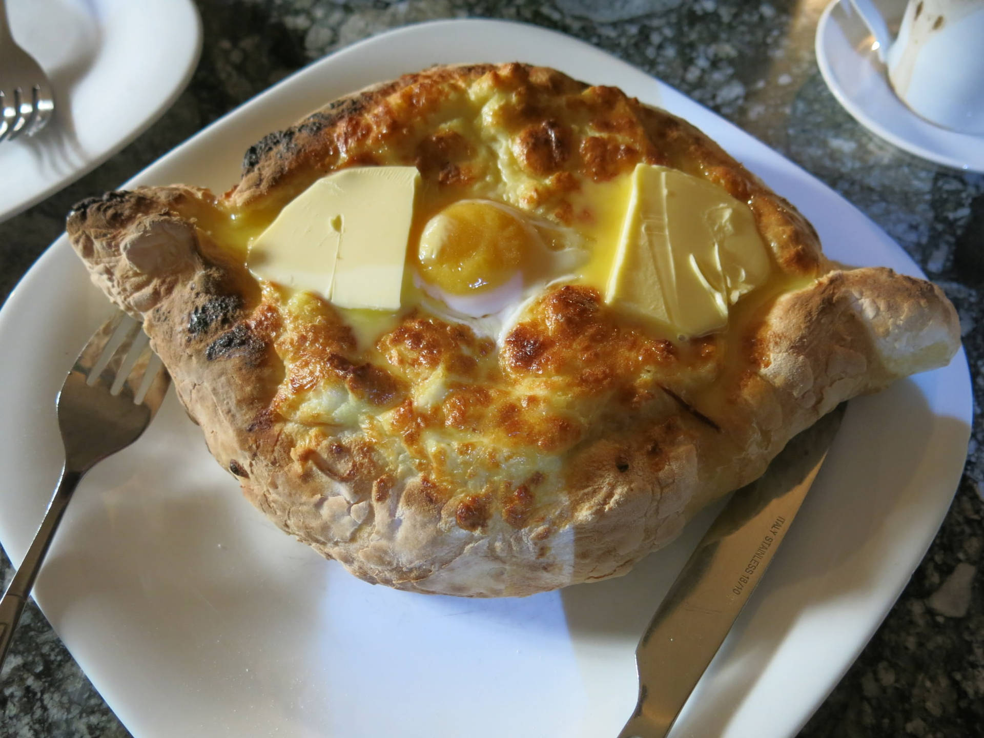 Savor The Traditions With Boat-shaped Adjarian Khachapuri