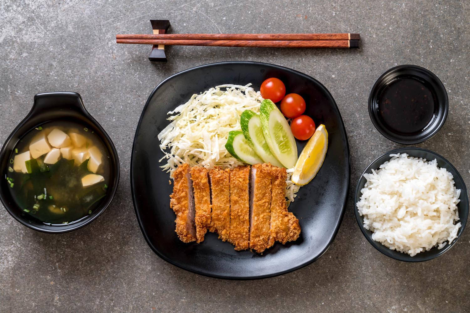 Savory And Authentic Japanese Tonkatsu Meal Background