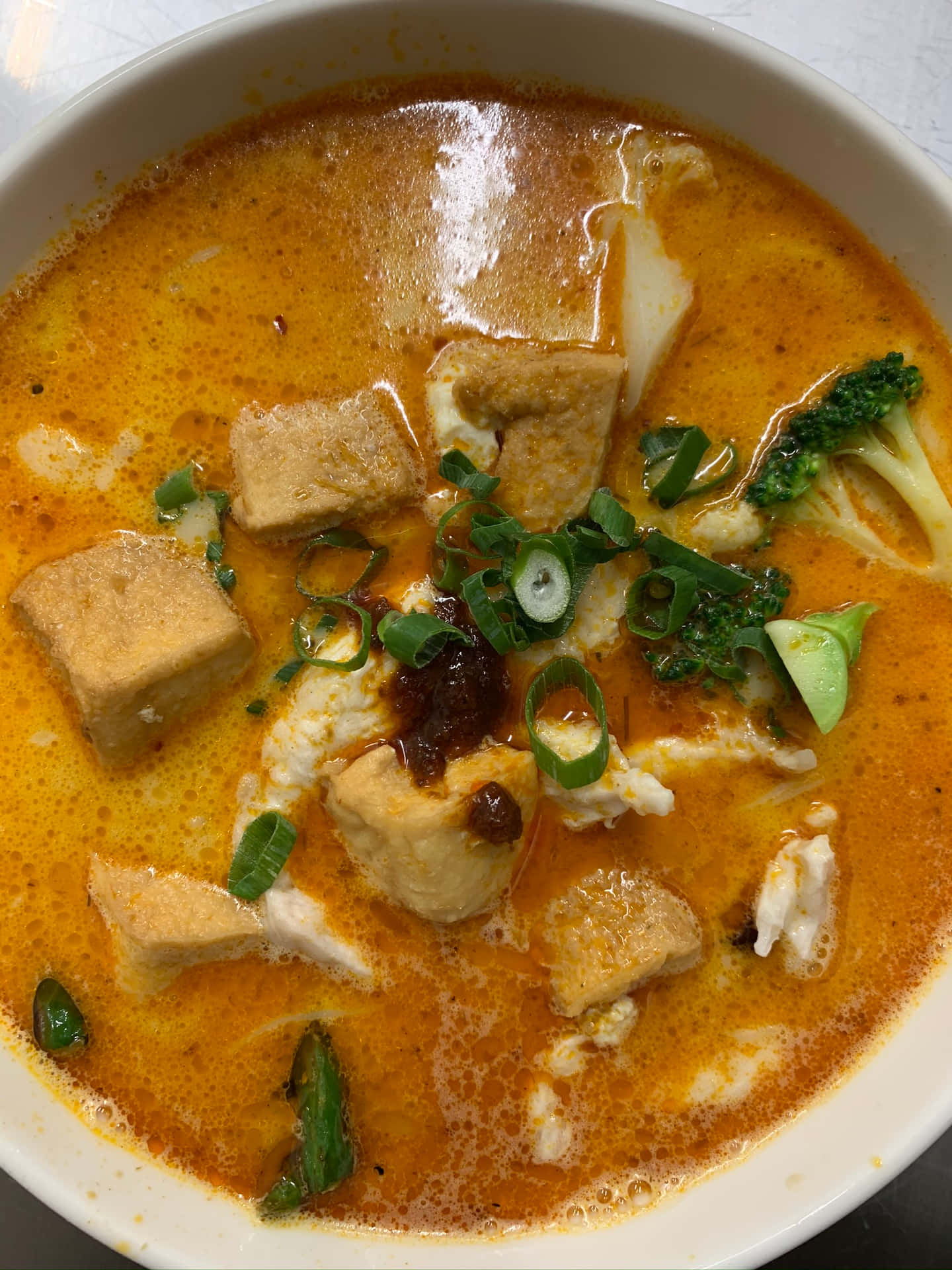 Savory And Spicy Curry Laksa With Spring Onions And Broccoli