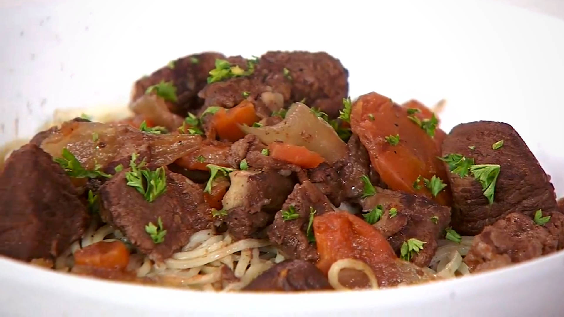 Savory Beef Bourguignon With Noodles Background