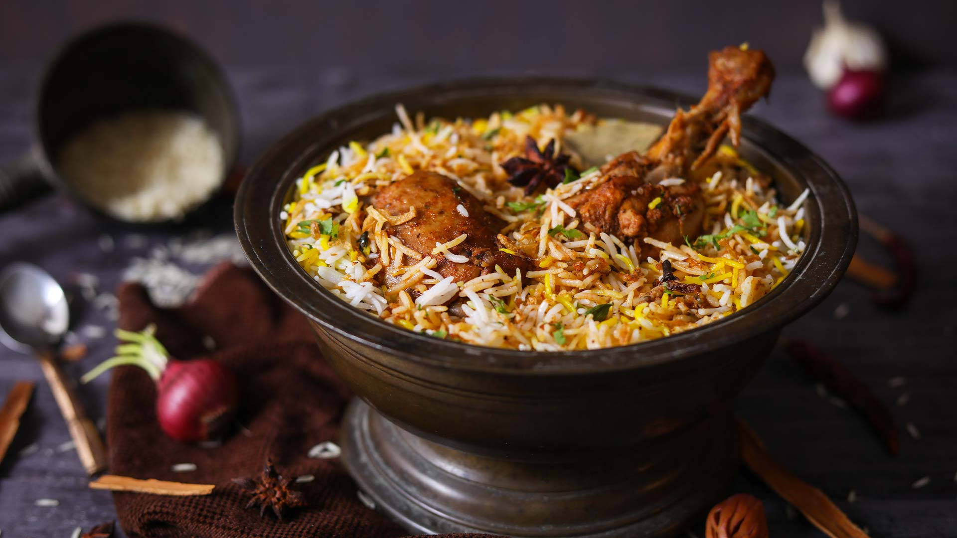 Savory Chicken Biryani In Iron Dish Background