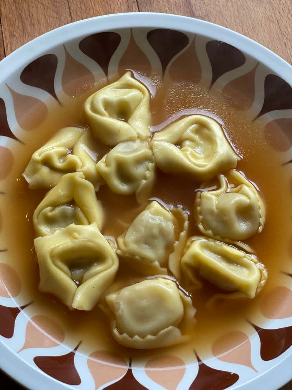 Savory Home-cooked Tortellini In Brodo Background