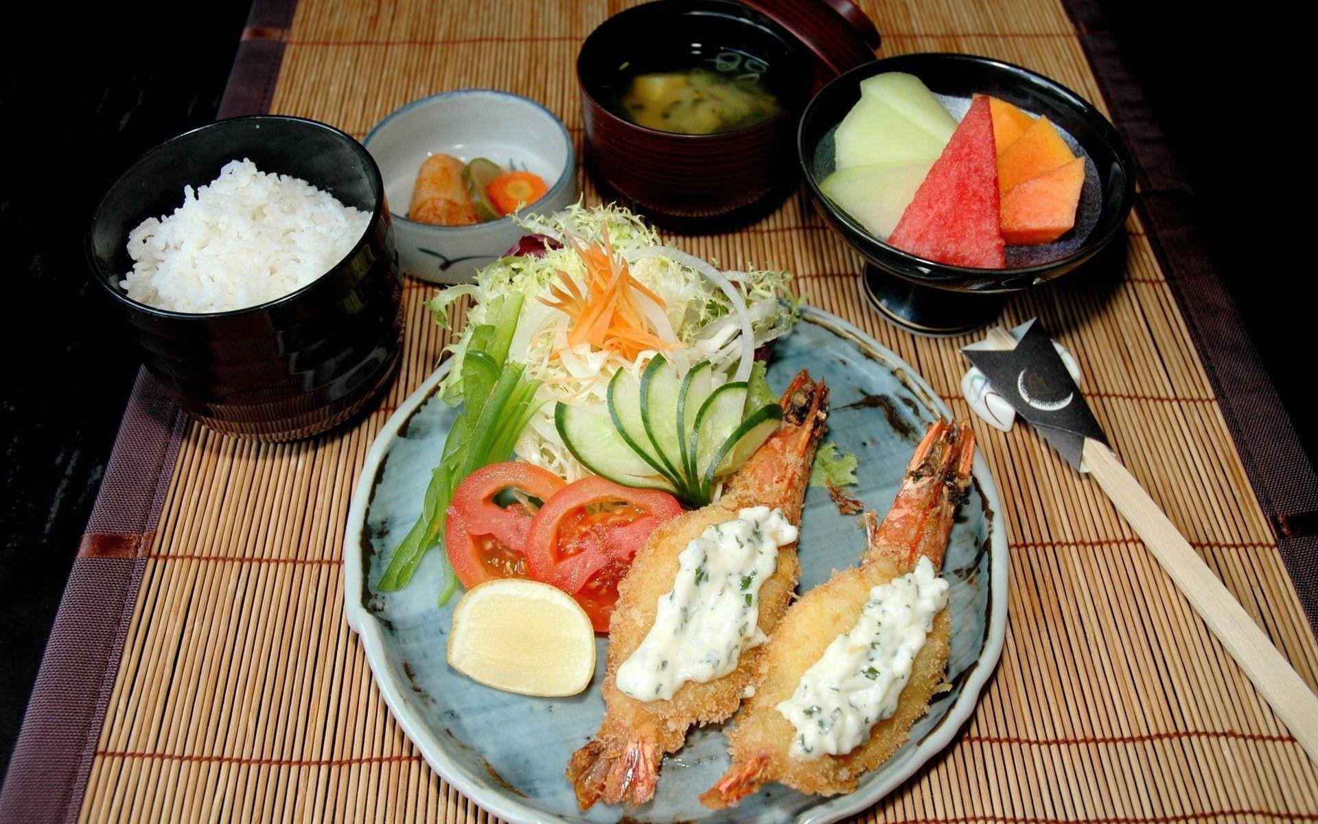 Savory Japanese Lunch Feast - Crispy Tempura And Fresh Veggies Background