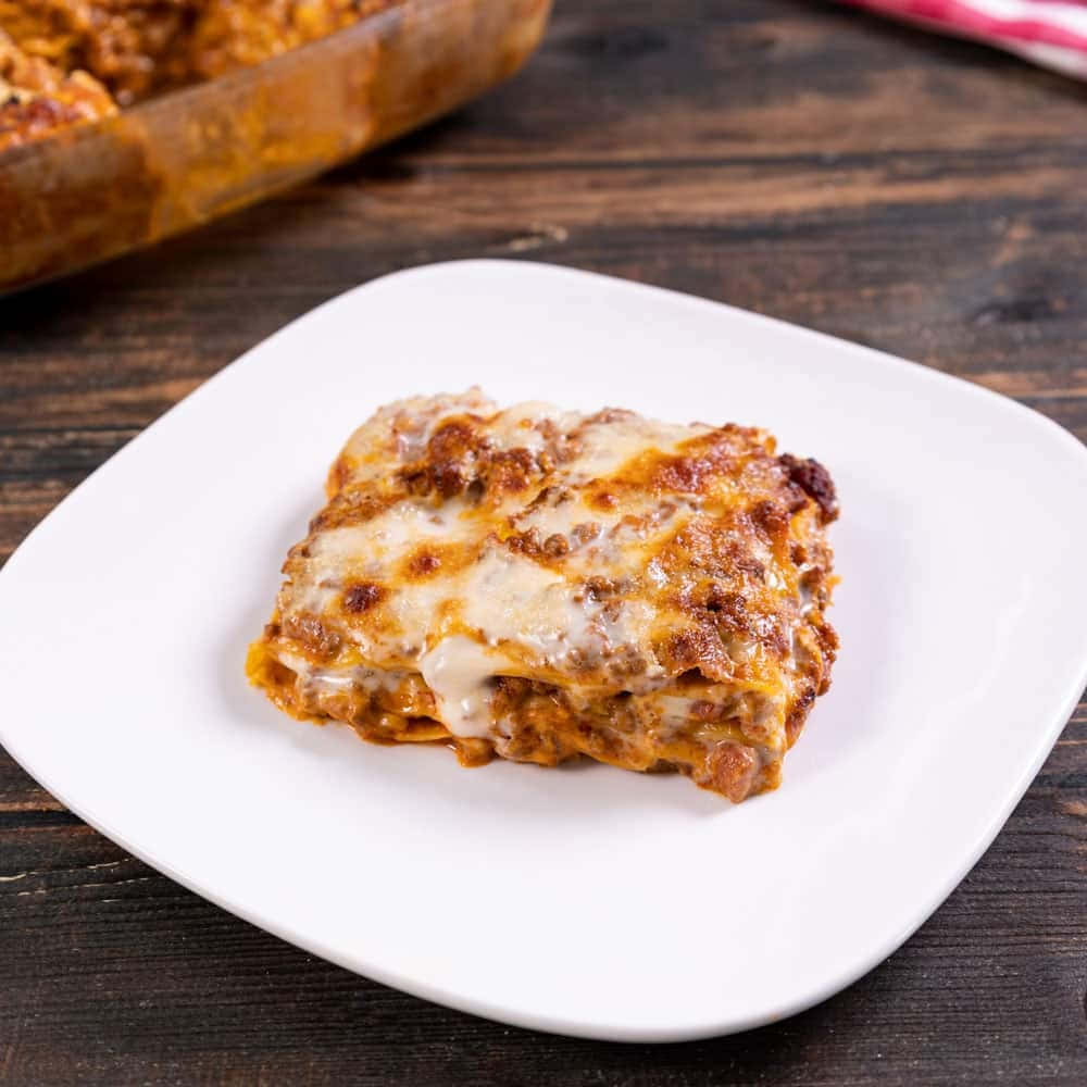 Savory Lasagna Alla Bolognese Ready For Serving Background