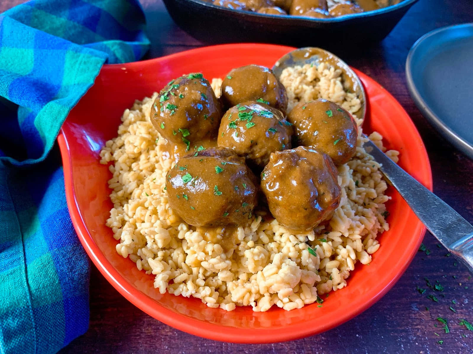 Savory Meatballs Over Rice Background