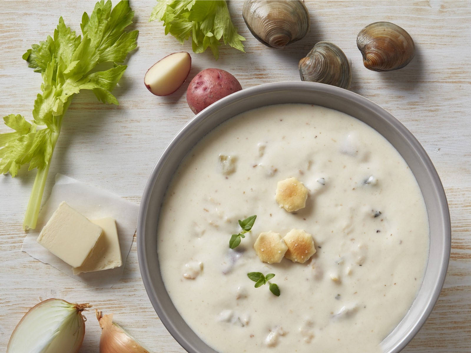 Savory New England Clam Chowder With Crackers Background