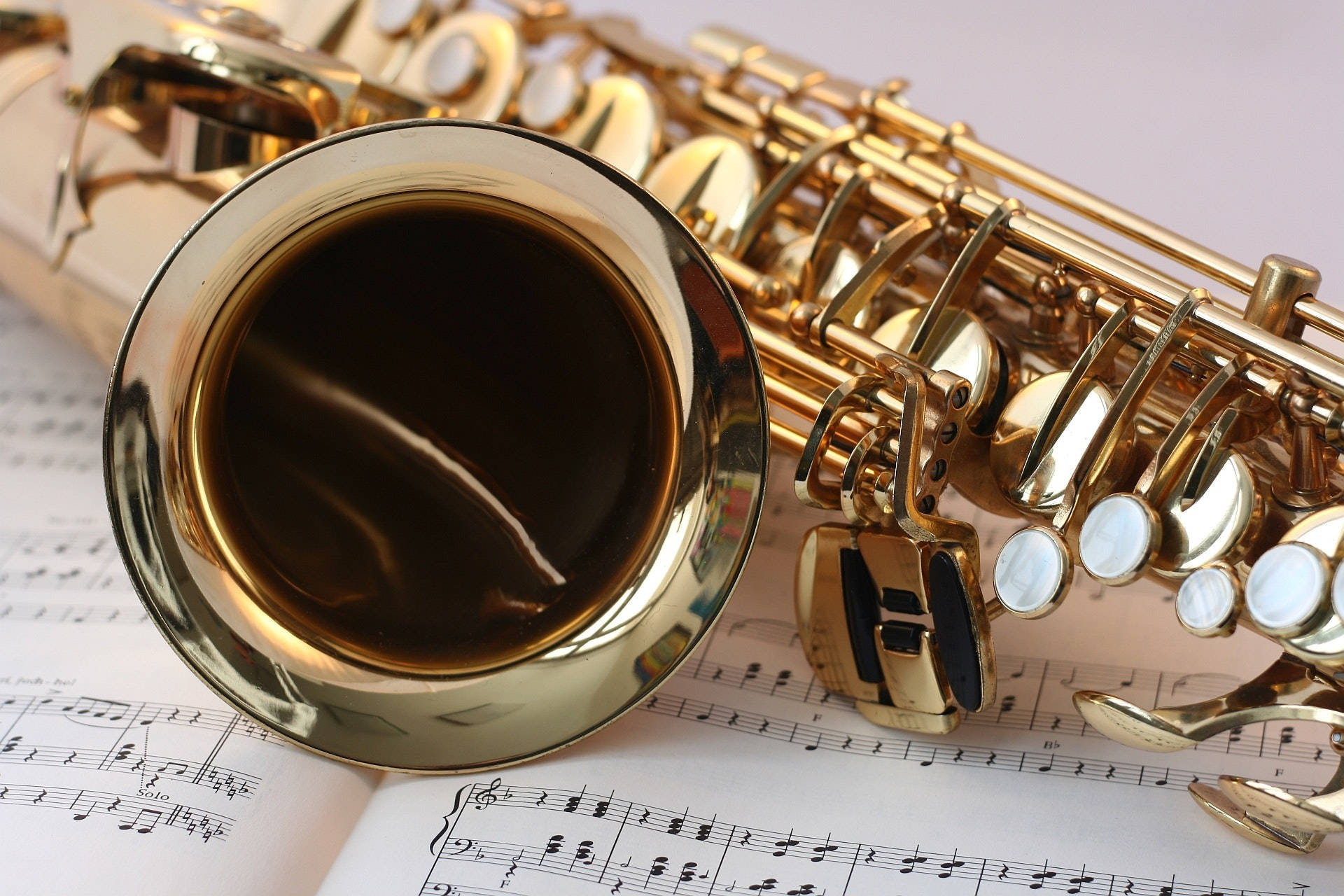 Saxophone On Sheet Music 4k Background