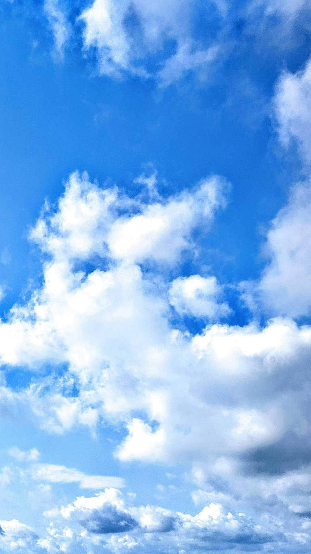 Scattered Clouds Phone Background