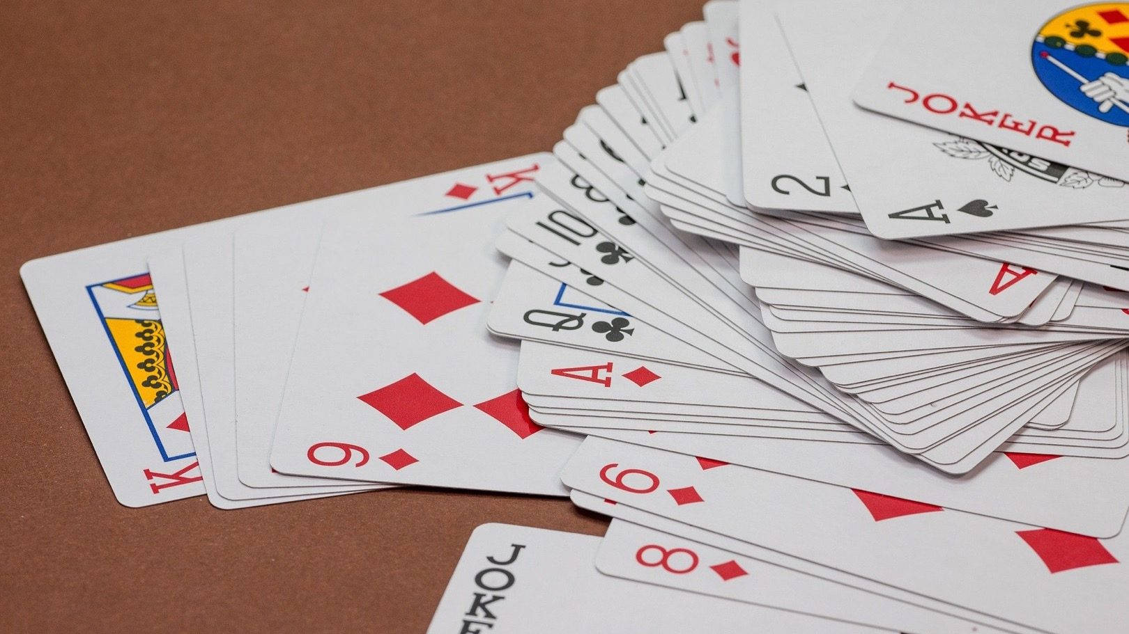 Scattered Deck Of Rummy Playing Cards