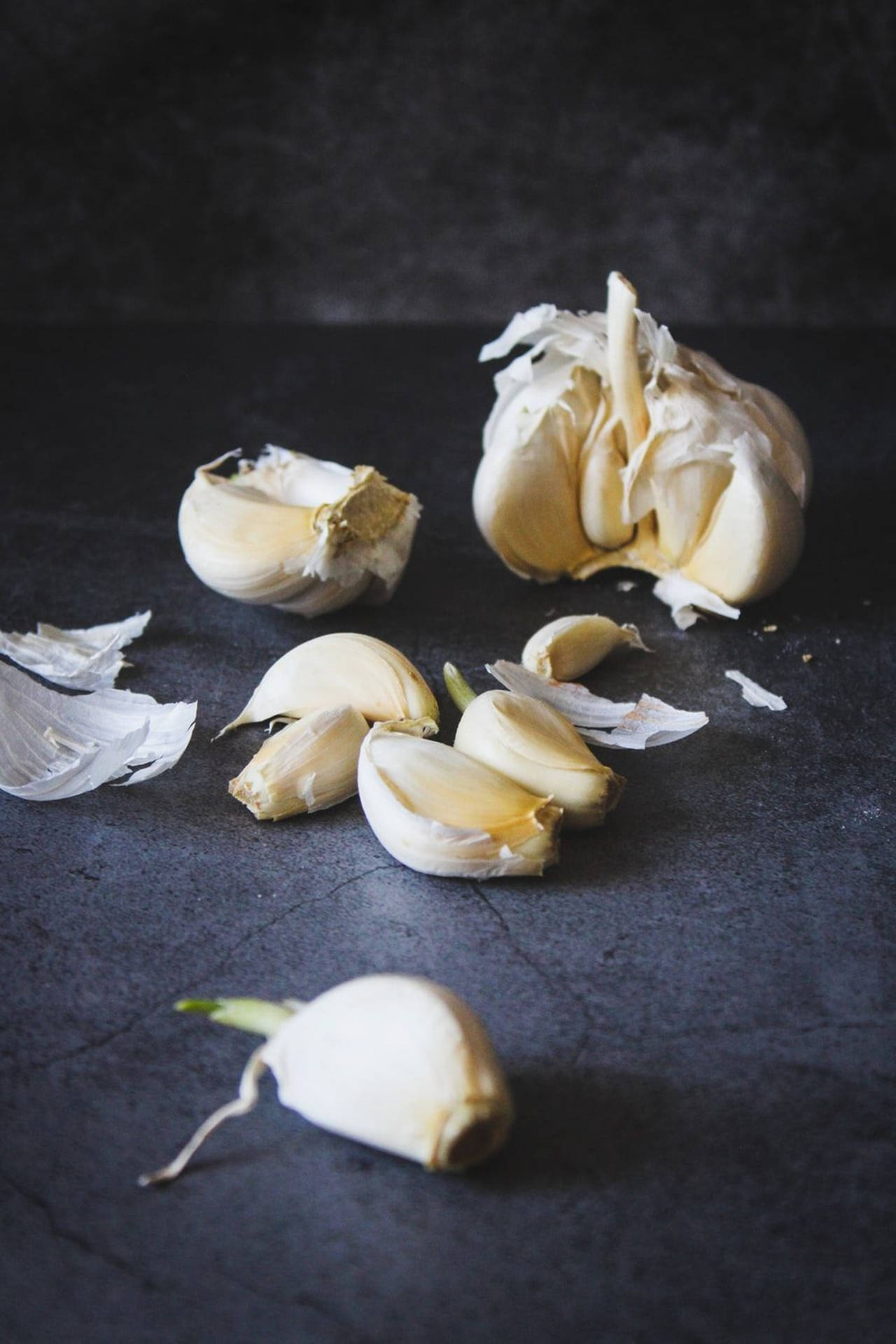 Scattered Garlic Vegetable Herb Vignette Lighting Background