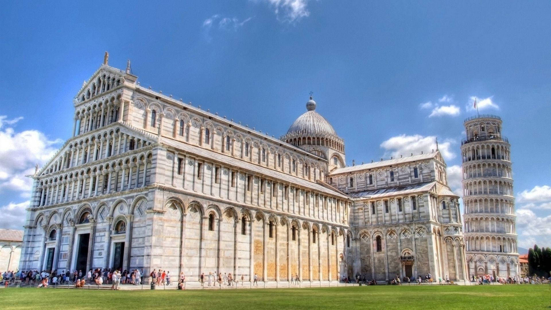 Scenic Cathedral And Leaning Tower Of Pisa Background