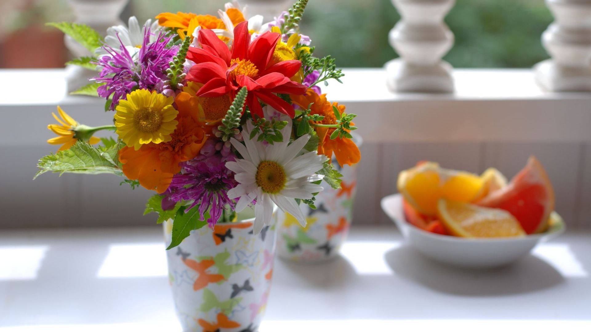 Scenic Display Of Fresh Flowers In Elegant Vase Background