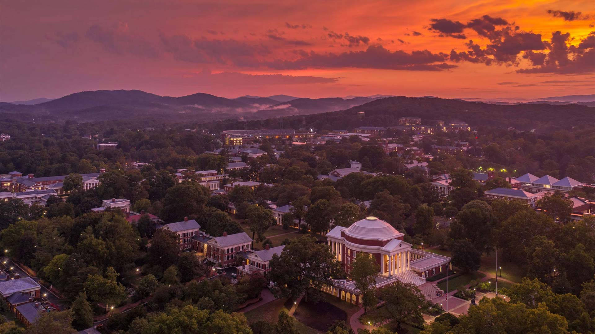 Scenic Drone Shot Of University Of Virginia At Sunset Background