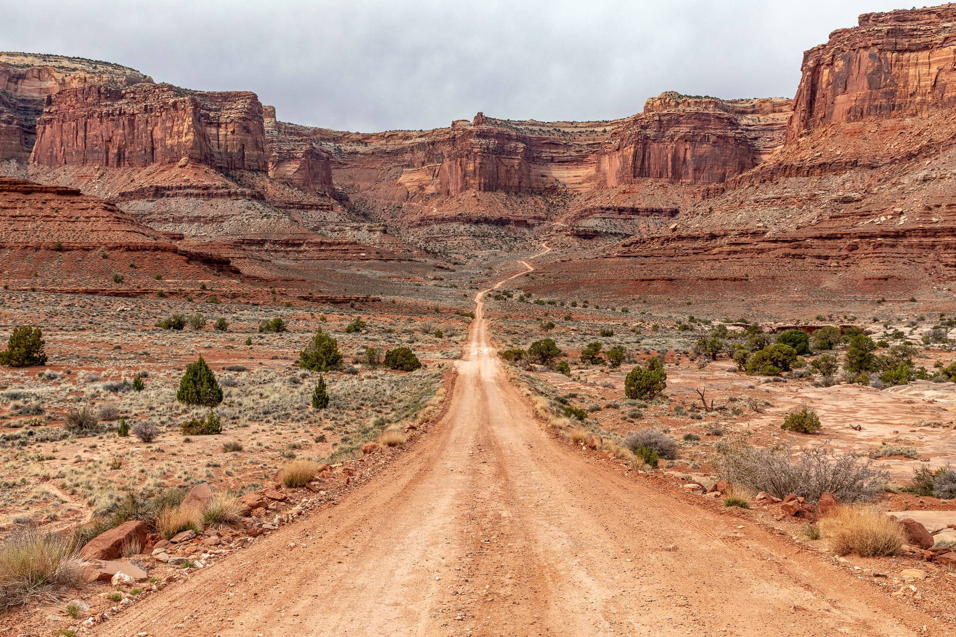 Scenic Route Through The Breathtaking Landscapes Of Canyonlands National Park Background