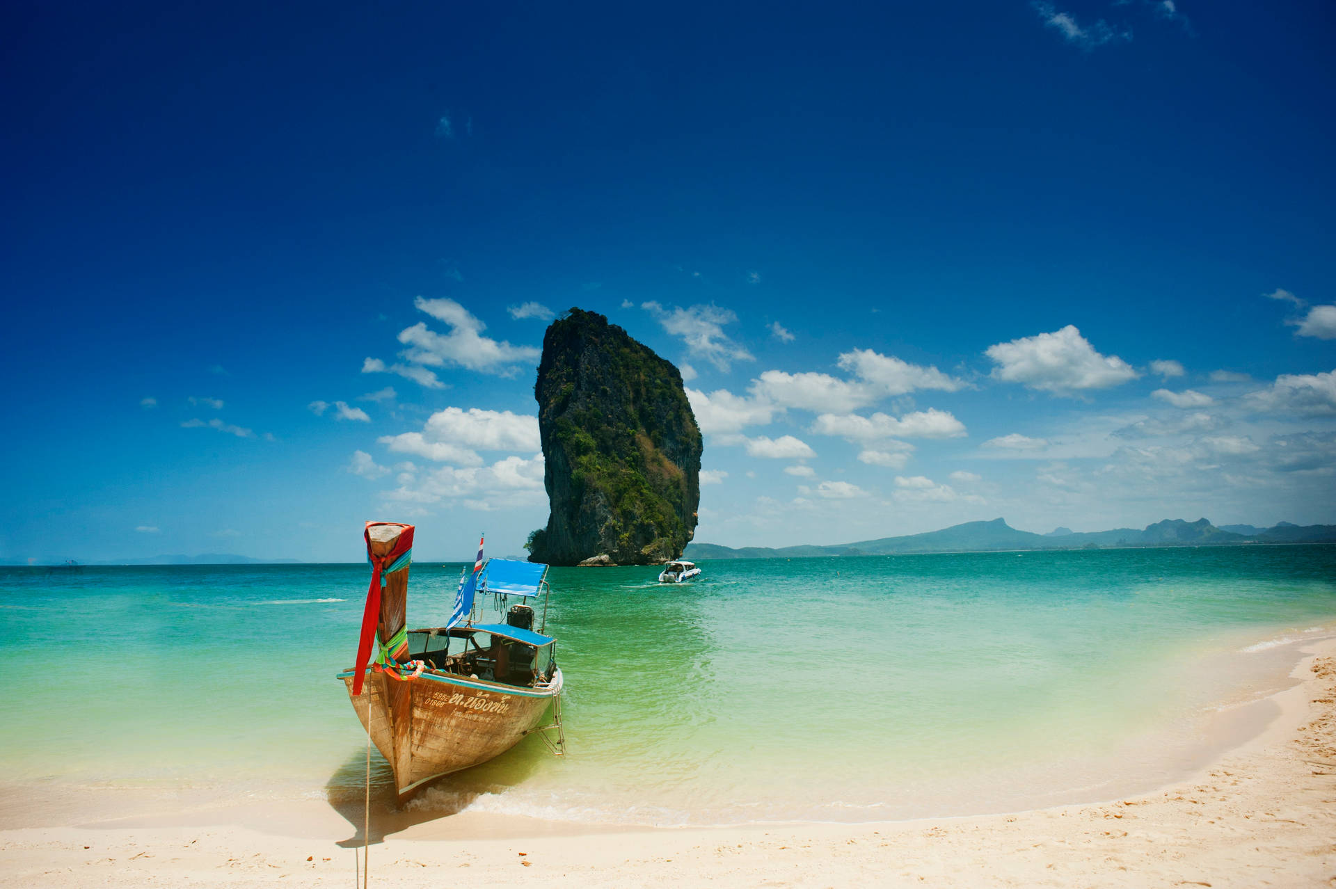 Scenic View Of Boat Moored On Pattaya Beach Background