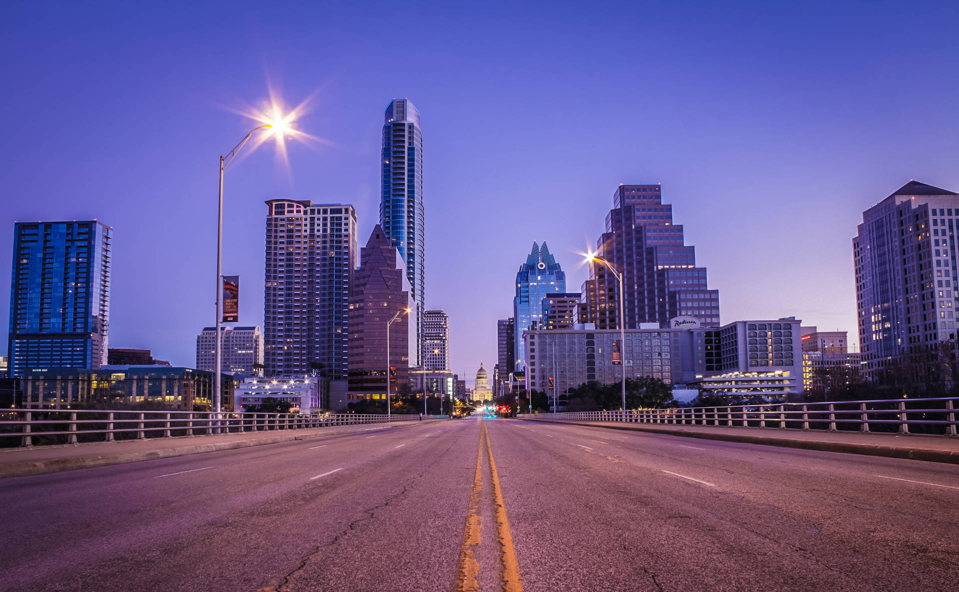 Scenic View Of Congress Bridge In Downtown Austin Background