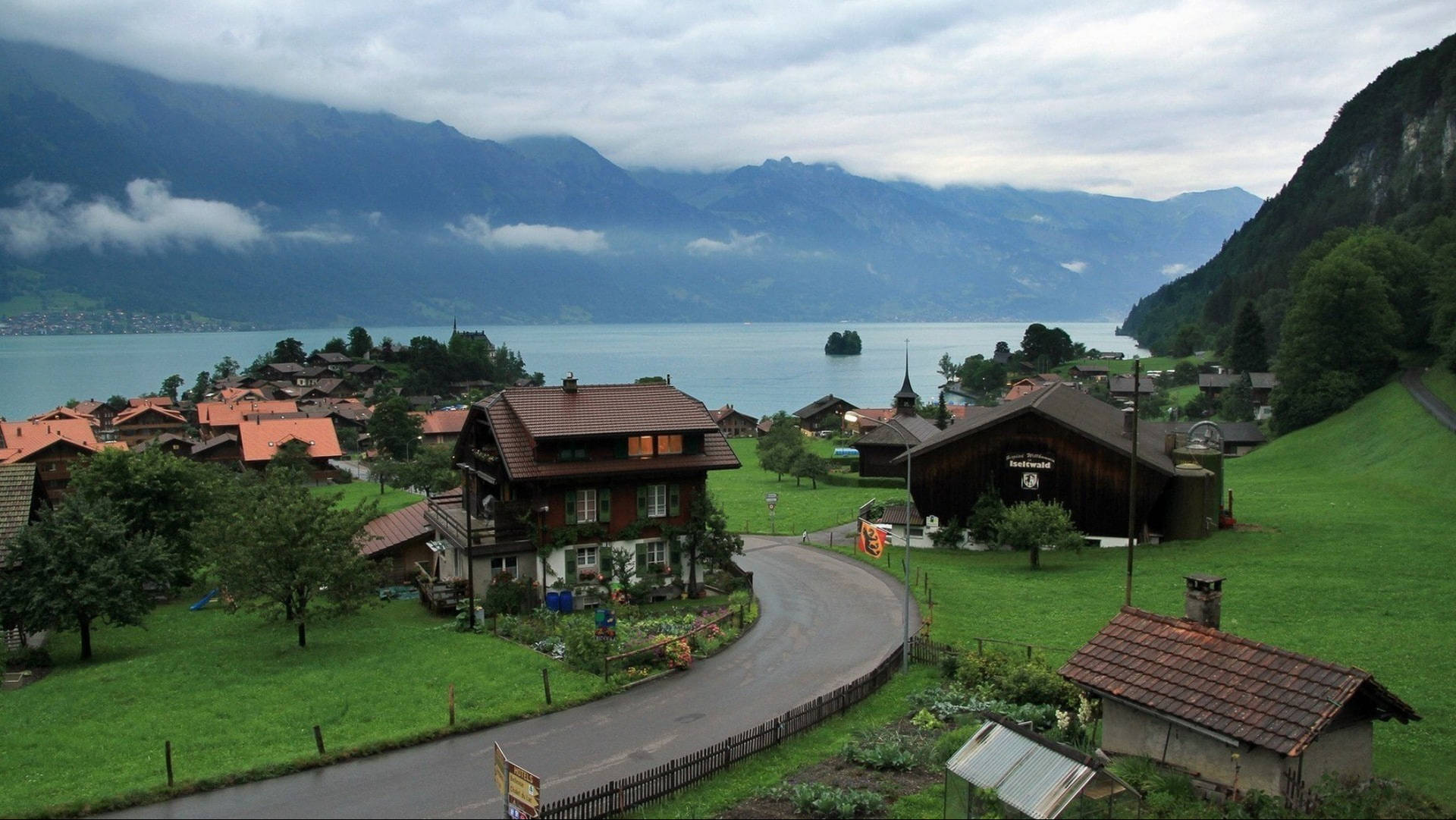 Scenic View Of Iseltwald Village, Switzerland Background