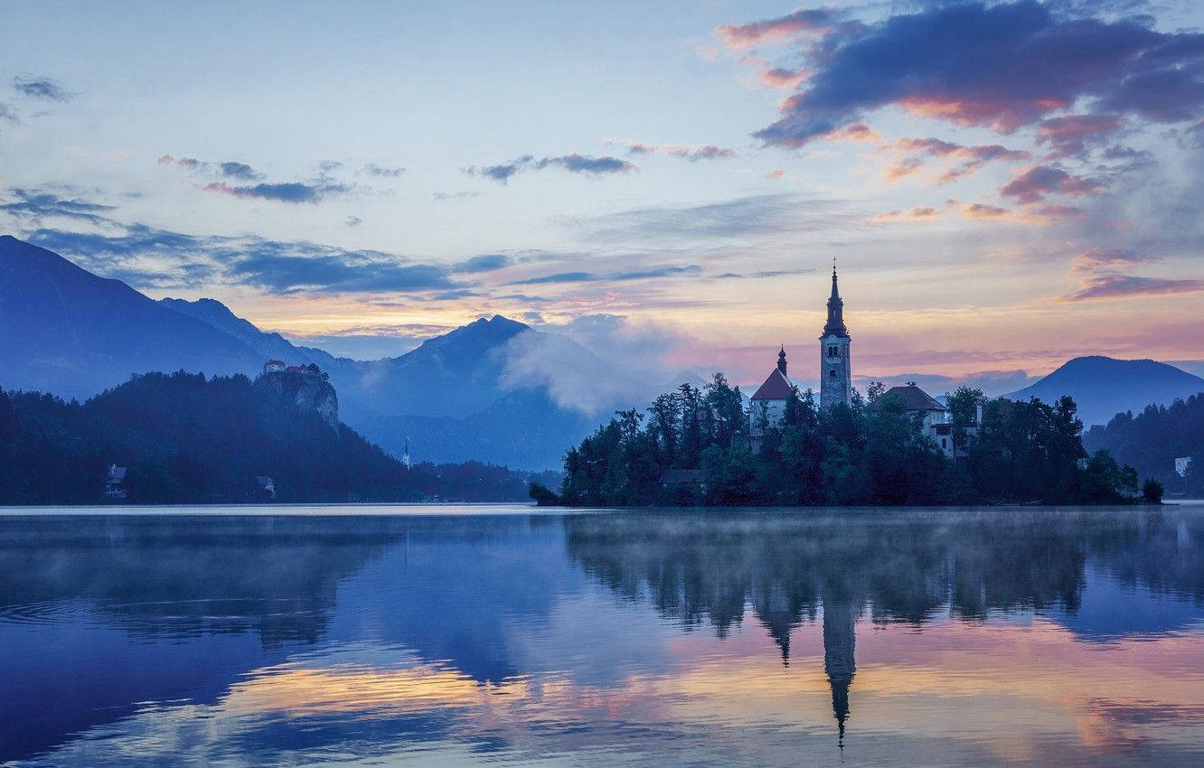 Scenic View Of Lake Bled, Slovenia Background